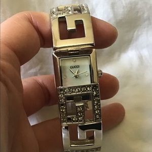 Silver tone bangle bracelet watch